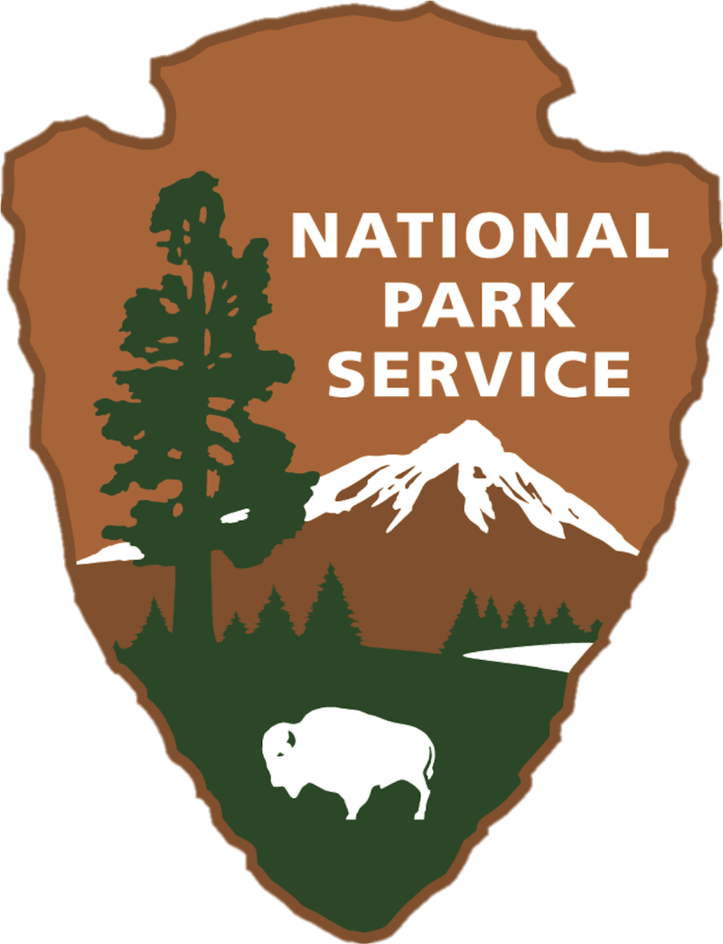 NATIONAL PARK SERVICE logo featuring tree, mountain, and bison